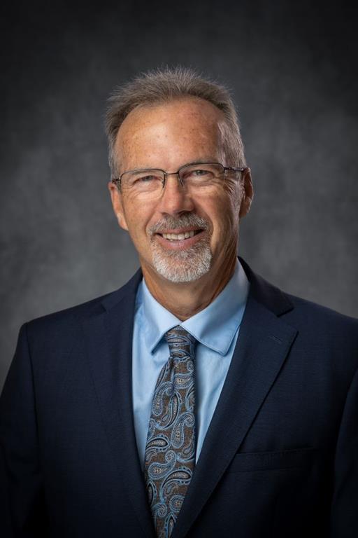 formal headshot of Roger Clark 